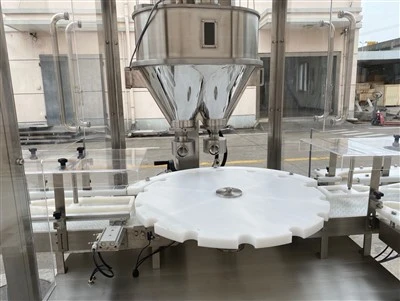 Automatische Doppelkopf-Schneckenfüllmaschine mit Drehtisch